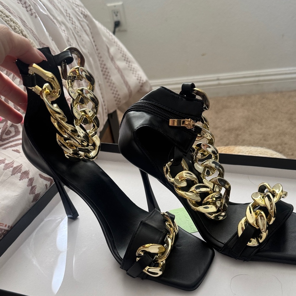 Unlisted Black Heels with Gold Chain Accents